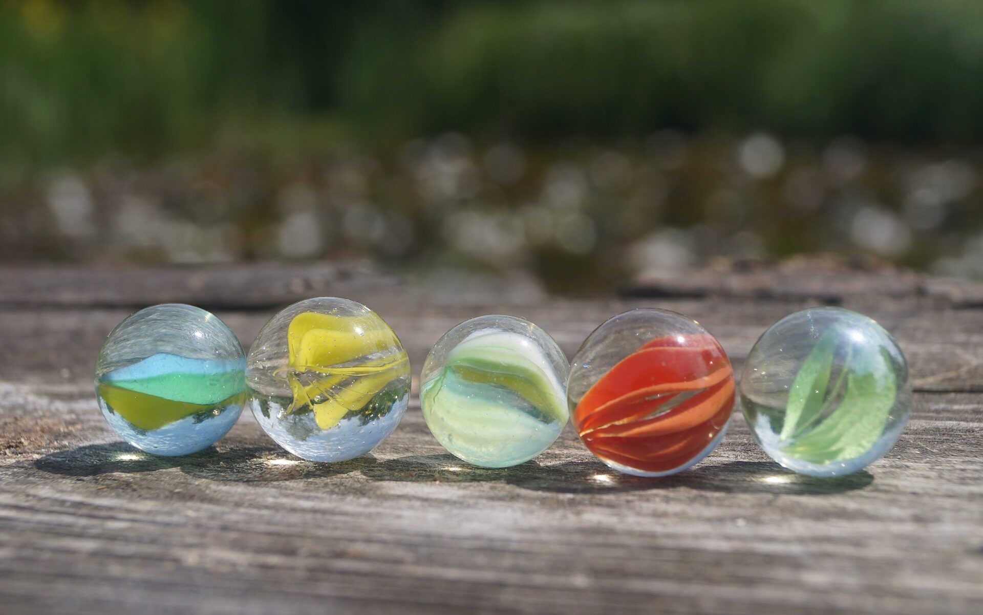 Münzen werfen 3 Glasmurmeln